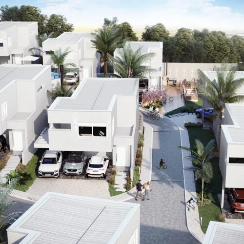 vista aérea de um condominio de sobrados individuais de arquitetura moderna na cor gelo sendo todos iguais, com estacionamento aberto e coberto, ruas em bloquete de concreto com pessoas circulando