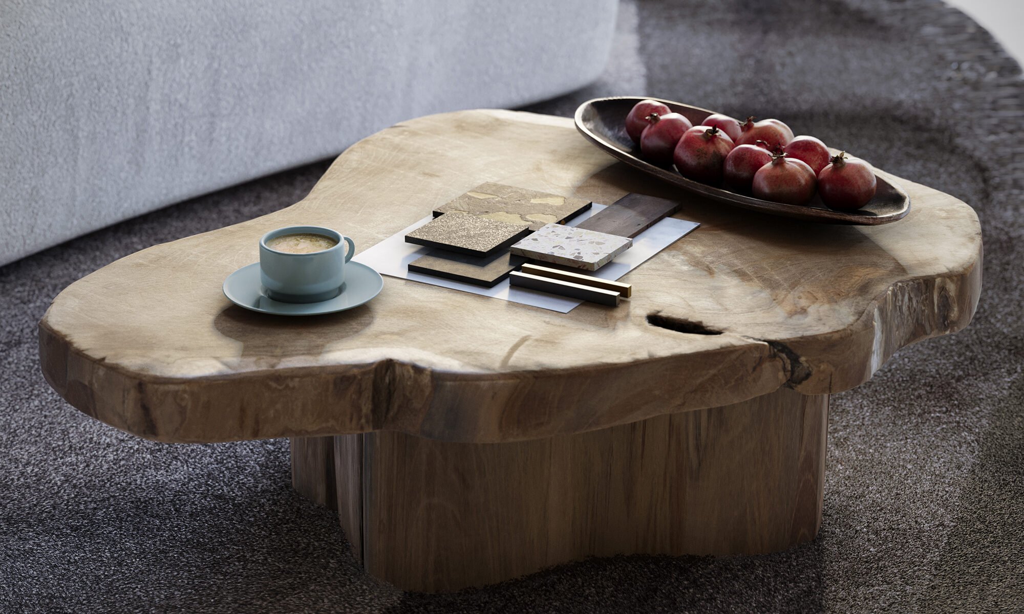 mesa de madeira em tronco bruto de forma organiza com café e materiais dispostos sobre ela