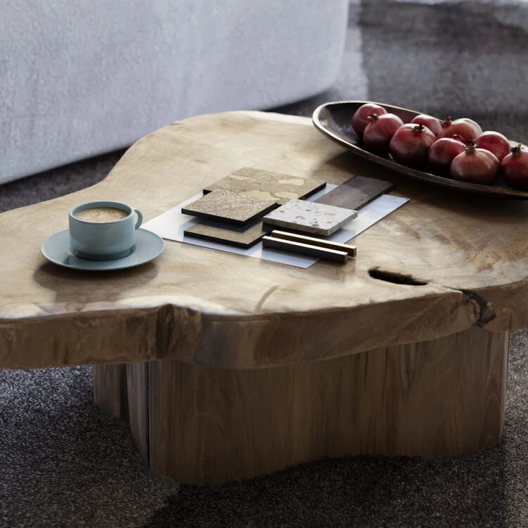 mesa de madeira em tronco bruto de forma organiza com café e materiais dispostos sobre ela